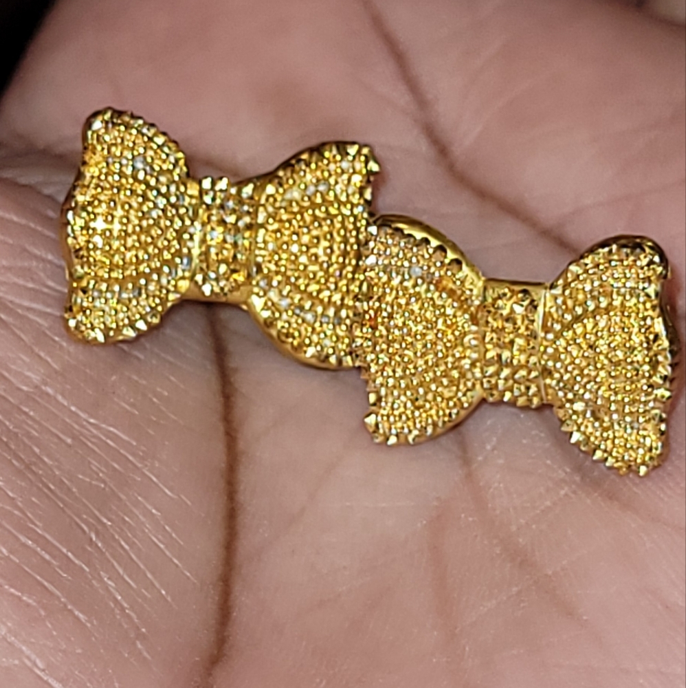 Gold bow stud earrings